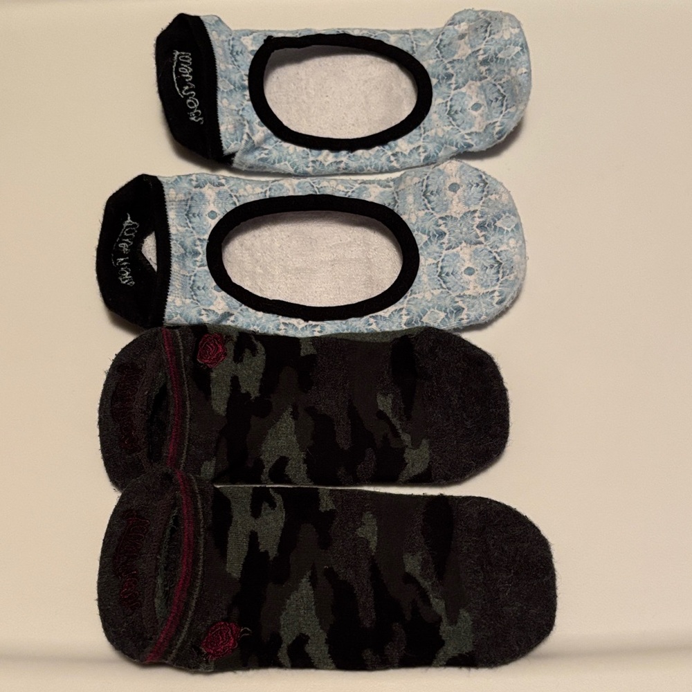 Tavi Noir Socks. 1 light blue with cut out and 1 green camo design